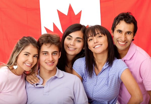 Group of English or French students with the flag of Canada